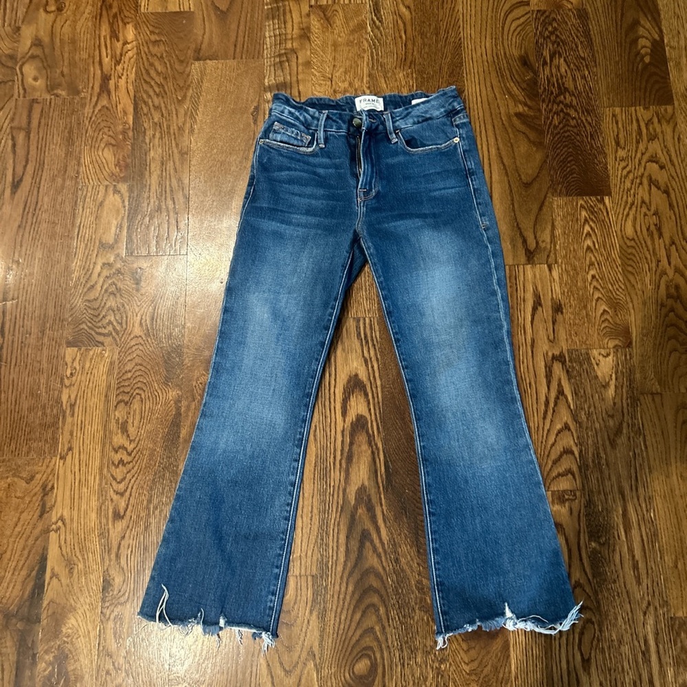 Blue frame jeans.